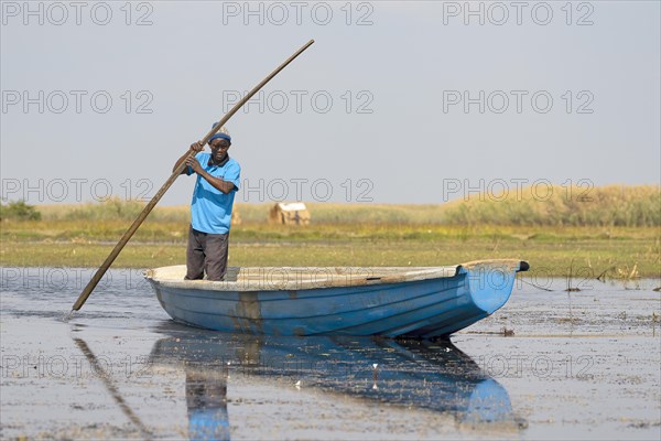 Fishermen in canoe