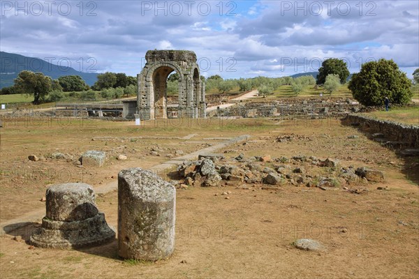 Roman excavation site Ciudad Romana de Caparra with archway near Oliva de Plasencia