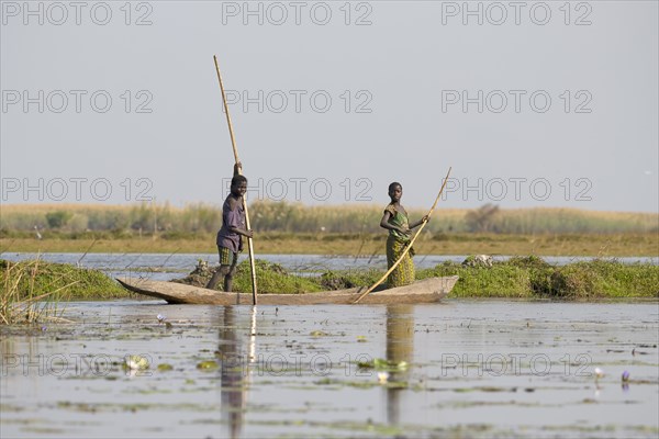 Fishermen in canoe