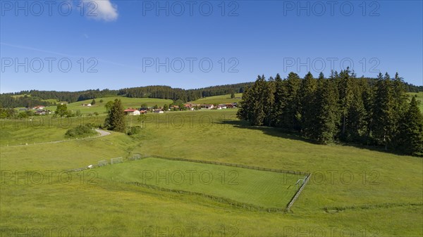 Aerial view of a football field in the Allgaeu region with a stream as a sideline
