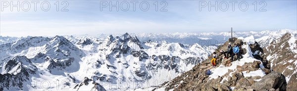 Mountaineers at the summit of the Sulzkogel