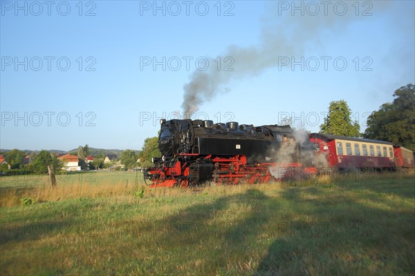 Harzer Schmalspurbahn steam locomotive with train