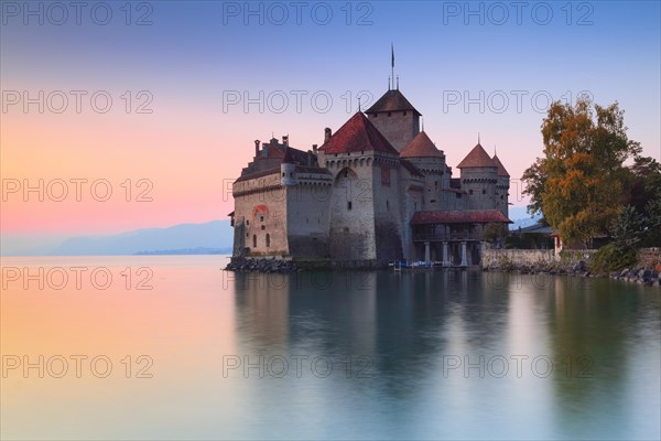 Chillon Castle at dusk on Lake Geneva in the canton of Vaud