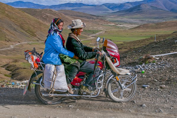 Couple on a motorbike along the southern route into Western Tibet