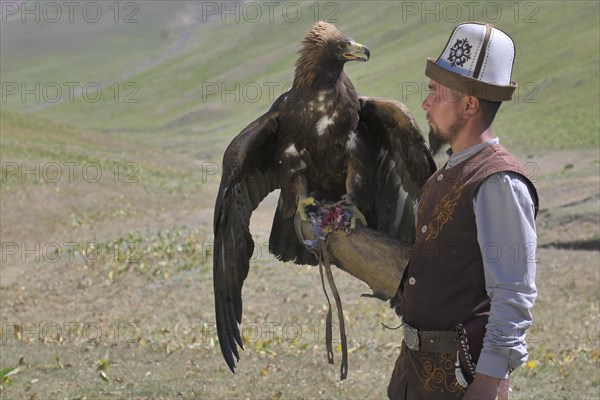 Kyrgyz hunter with Golden Eagle