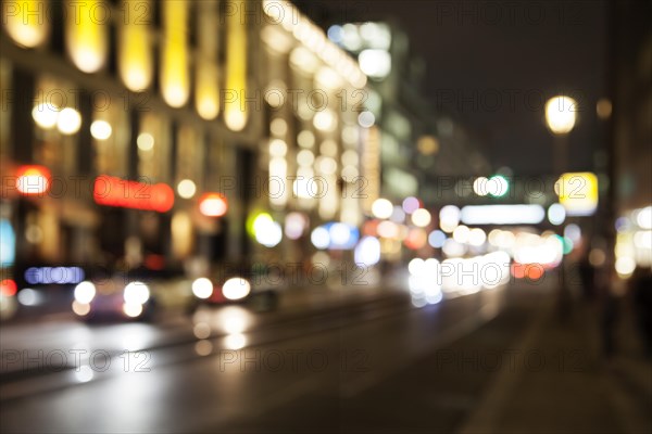 Blurred headlights in evening rush hour traffic