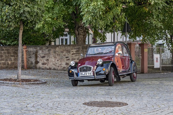 Vintage car Citroen 2CV in motion