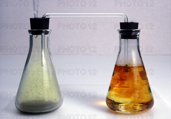 Bubbling Chlorine Gas into Sodium Bromide to Yield Bromine