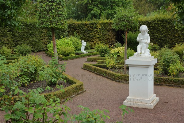 Russian Garden with Two White Stone Cherubs