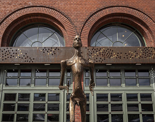 Bronze sculpture Adam and Eve by Rolf Biebl