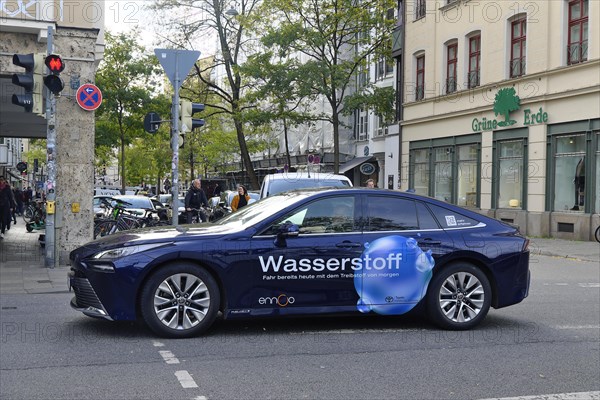 Toyota passenger car with hydrogen drive on the road