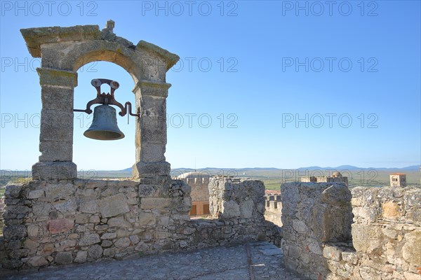 Bell gable with battlements and stone walls at the castillo