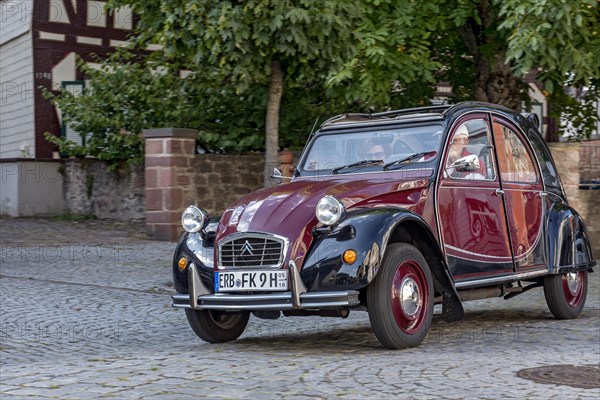 Vintage car Citroen 2CV in motion