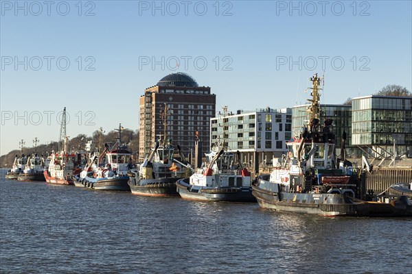 Tugboat at the New Tugboat Bridge in the harbour near Oevelgoenne