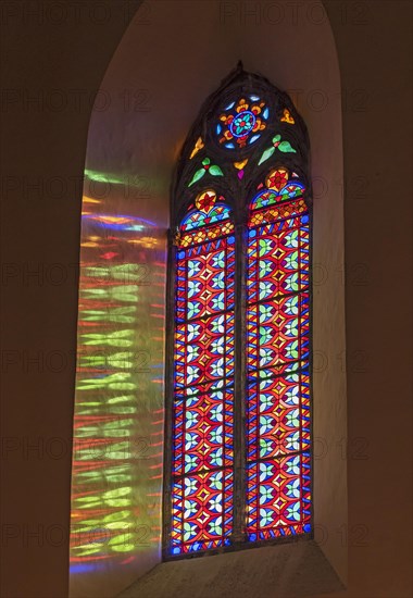 Stained glass window inside Perugia Cathedral