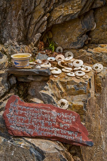 Plates with buddhist inscriptions at the blue buddha in Lhasa