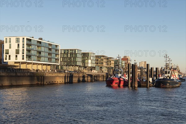 Tugboats in the evening light at the New Tugboat Bridge in the harbour near Oevelgoenne