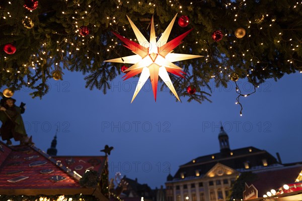 Christmas market lights in a town square as Advent begins. Coburg