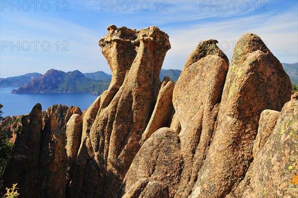 Granite rock formation on the coastal road through the Calanche de Piana in the Corsica nature park Park