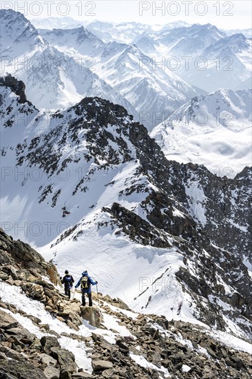 Mountaineers at the summit of the Sulzkogel