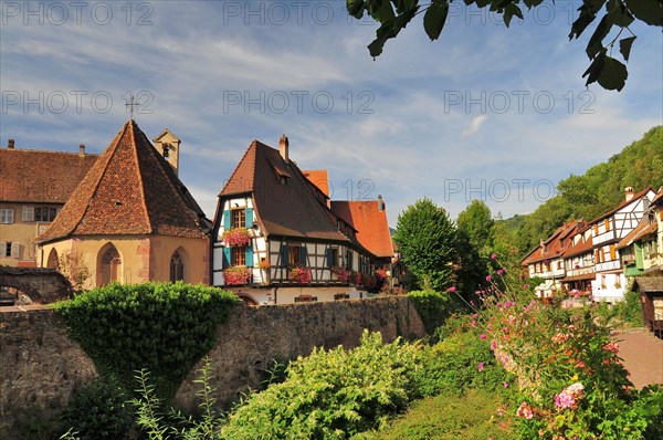 Half-timbered houses on the Weiss river in the town of Kaysersberg