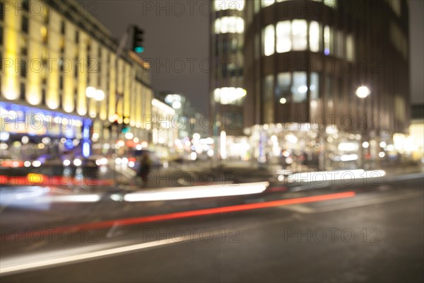 Blurred headlights in evening rush hour traffic