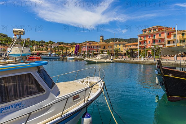 Boats anchor in the harbour of Porto Azzurro