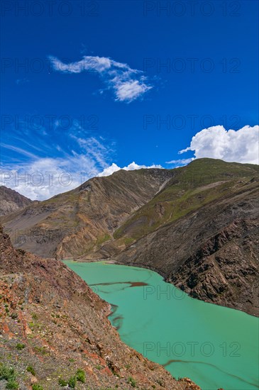 Turquoise lake on the Karo-La Pass along the Friendship Highway