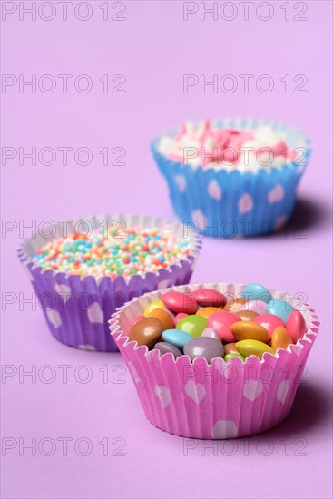 Chocolate lentils and love beads in paper moulds