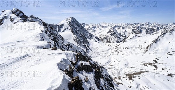 Mountain panorama of the Stubai Alps in winter with Schrankarkogel peak