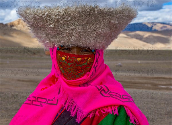 Traditional dressed woman on the festival of the tribes in Gerze Western Tibet