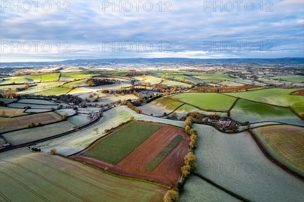 Frosty fields and farms from a drone