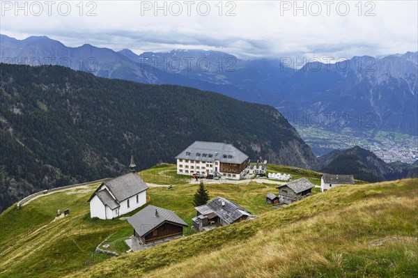 Neo-Gothic chapel on Luesgen and historic hotel