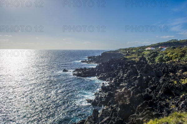 Rocky volcanic coastline around Sao Mateus