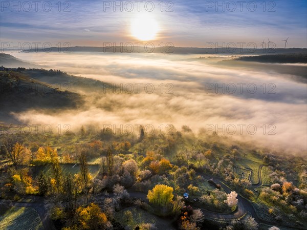 Drone view of sunrise with fog over valley Remstal