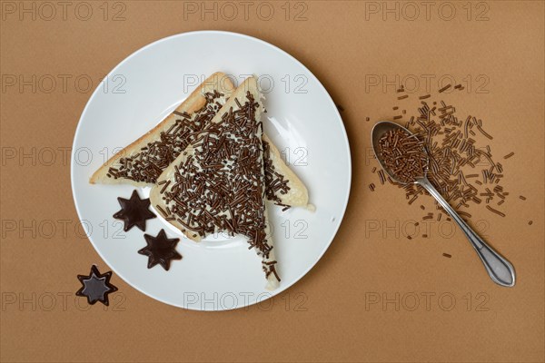 Toast with chocolate sprinkles on plate