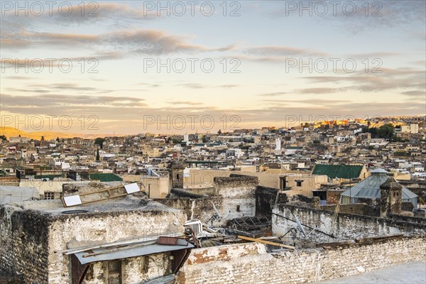 Aerial panoramic view of historic downtown called medina at sunset