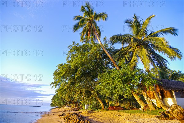 Bungalows at sunrise on the island Ile Sainte Marie