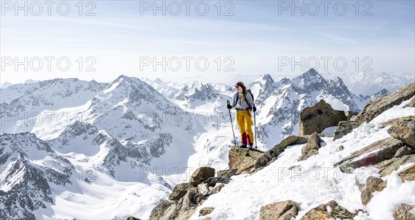 Mountaineer at the summit of the Sulzkogel