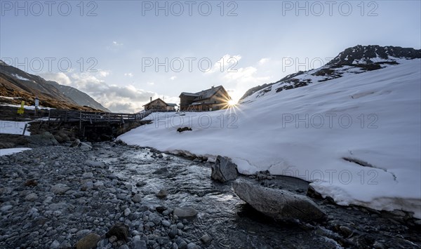 Oberbergbach and Franz-Senn-Huette mountain hut in winter