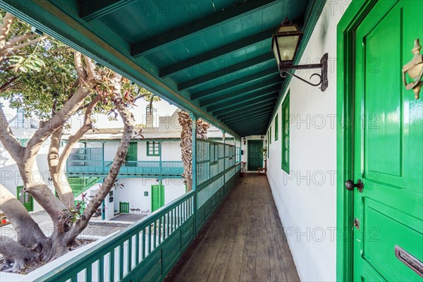 Picturesque white and green settlement called Pueblo Marinero designed by Cesar Manrique located in Costa Teguise