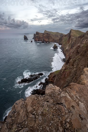 Red cliffs and rocks in the sea