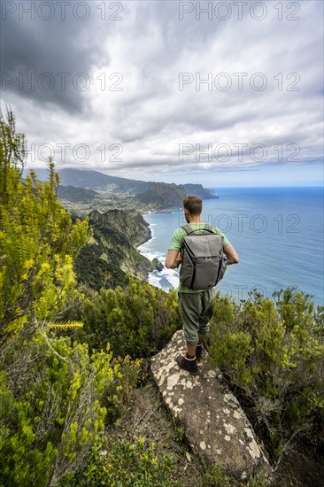 Hiker standing on a rock