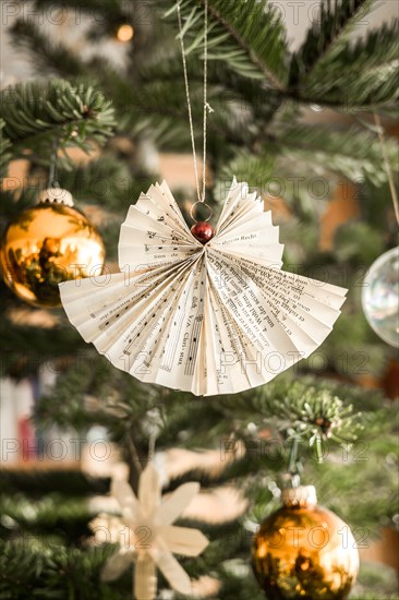 Handmade Christmas angel on christmas tree