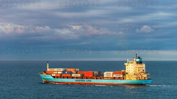 Maersk Line Container Ship on sea at sunrise