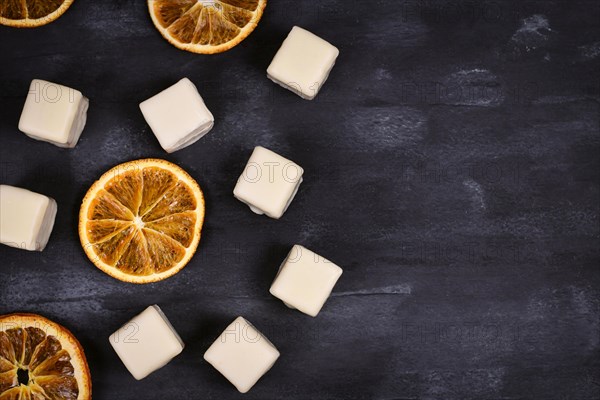 German Christmas candy called Dominosteine and orange slices. A traditional food consisting of gingerbread