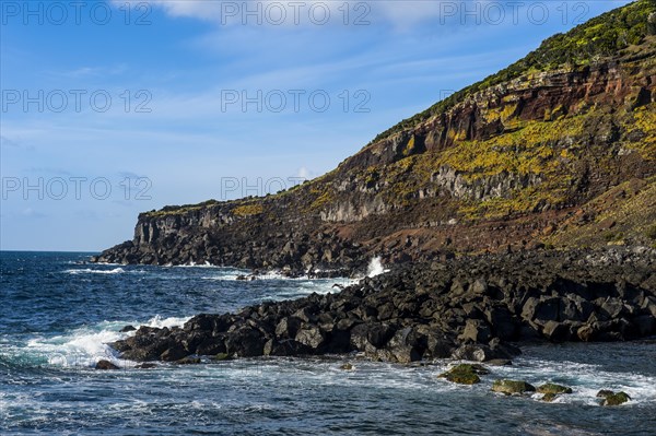 Rocky volcanic coastline around Sao Mateus