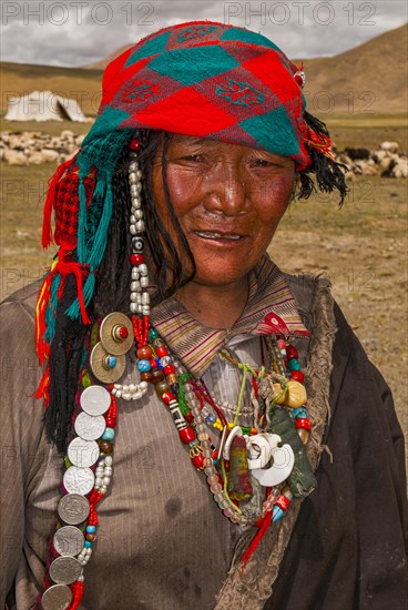 Traditional dressed women with a child