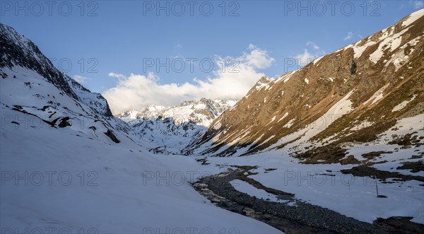 Snow-covered mountains in the evening light