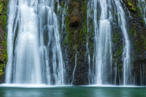 Waterfall from the source of the Lison in a haven of tranquillity with its waterfall surrounded by woods. Nans-sous-Sainte-Anne